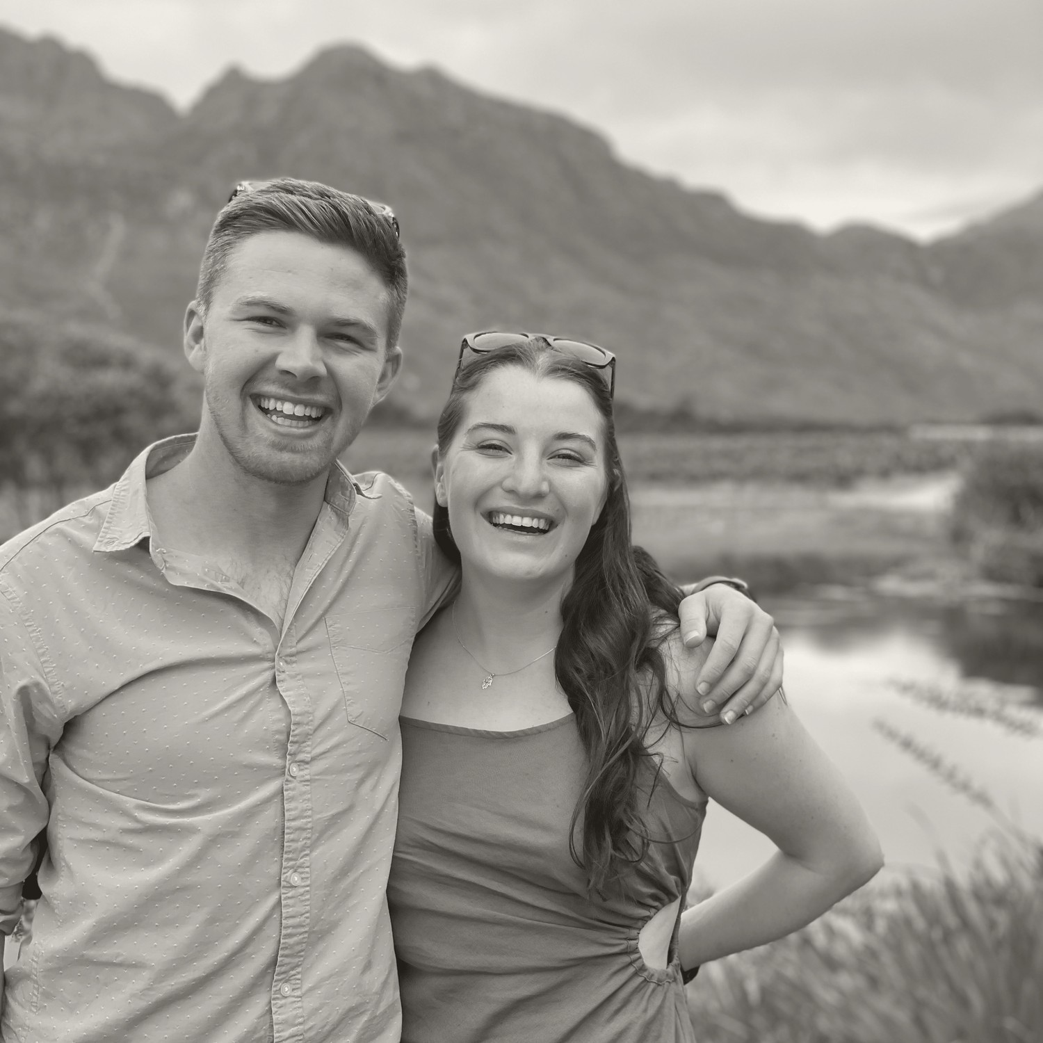 Jacques and Lara together, with the Cape mountains behind them.